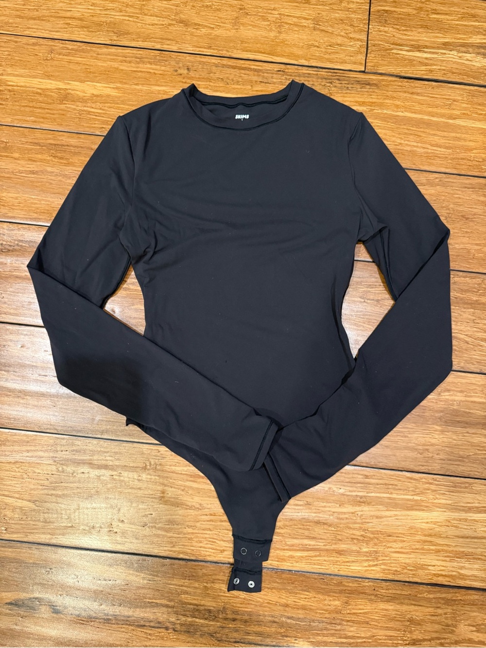 Skims Black Long Sleeve Snap Bodysuit